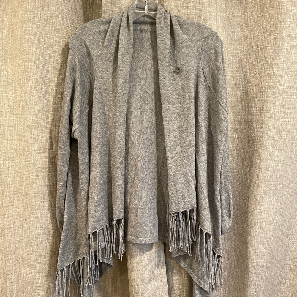 Grey, cashmere sweater. Super comfortable and cozy!
